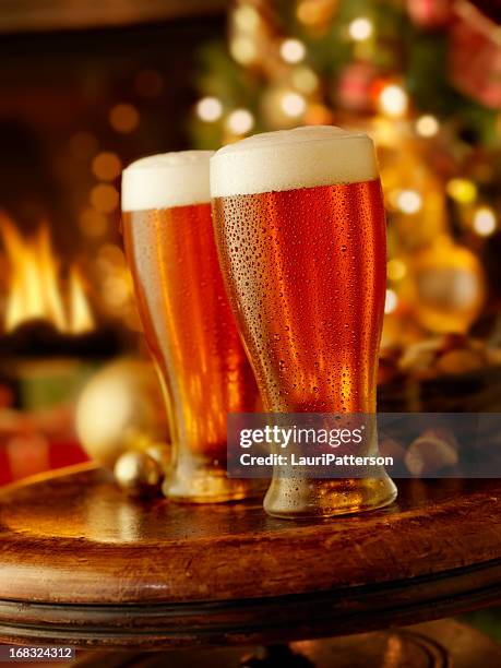 holiday beers - pint glass stock pictures, royalty-free photos & images