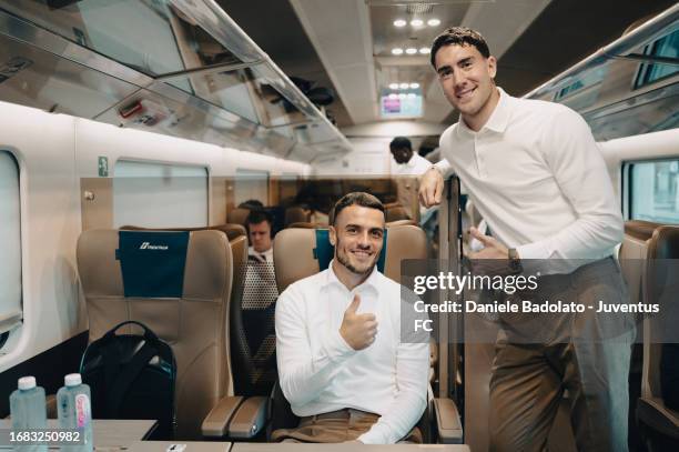 Filip Kostic, Dusan Vlahovic of Juventus during the team travel to Reggio Emilia ahead of the Serie A match with Sassuolo on September 22, 2023 in...