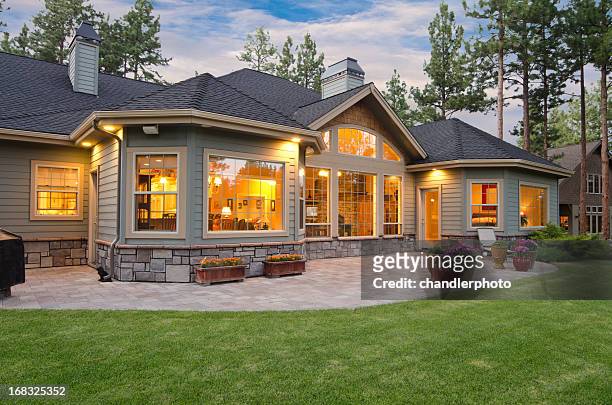 twilight exterior of home and landscape - illuminated stock pictures, royalty-free photos & images