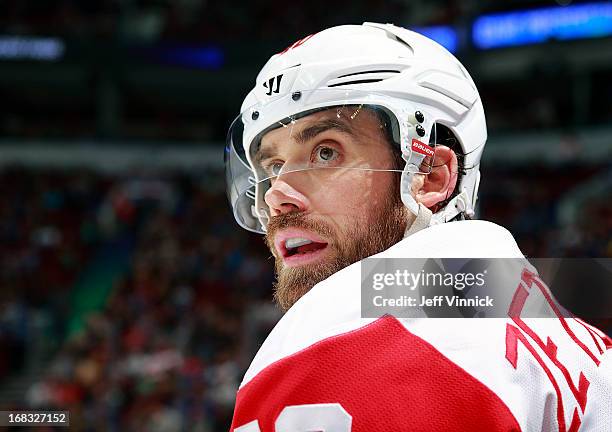 Henrik Zetterberg of the Detroit Red Wings looks on from the bench during their NHL game against the Vancouver Canucks at Rogers Arena April 20, 2013...