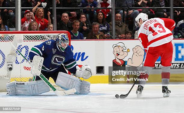 Pavel Datsyuk of the Detroit Red Wings lshoots on Cory Schneider of the Vancouver Canucks during their NHL game at Rogers Arena April 20, 2013 in...