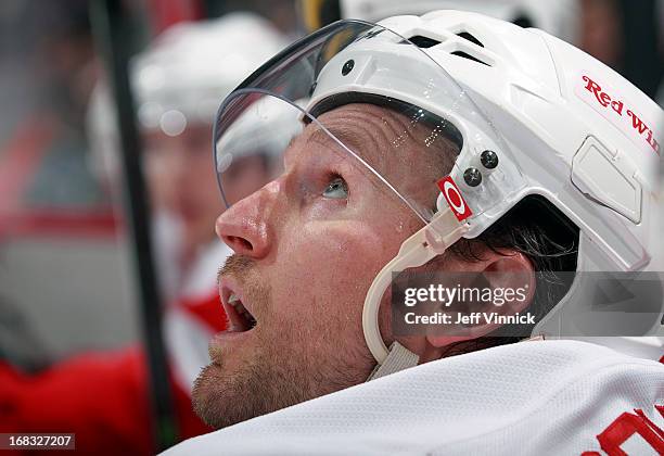 Niklas Kronwall of the Detroit Red Wings looks on from the bench during their NHL game against the Vancouver Canucks at Rogers Arena April 20, 2013...