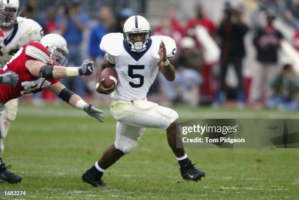 Penn State tailback Larry Johnson rushes during the NCAA football game against Ohio State at Ohio Stadium on October 26, 2002 in Columbus, Ohio. The...