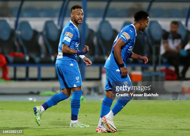 Salem Al-Dawsari of Al Hilal celebrates with Neymar Jr of Al Hilal after scoring the team's fifth goal during the match between Al-Hilal and Riyadh...