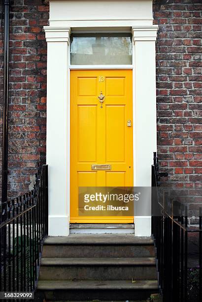 typical british houses - yellow door stock pictures, royalty-free photos & images