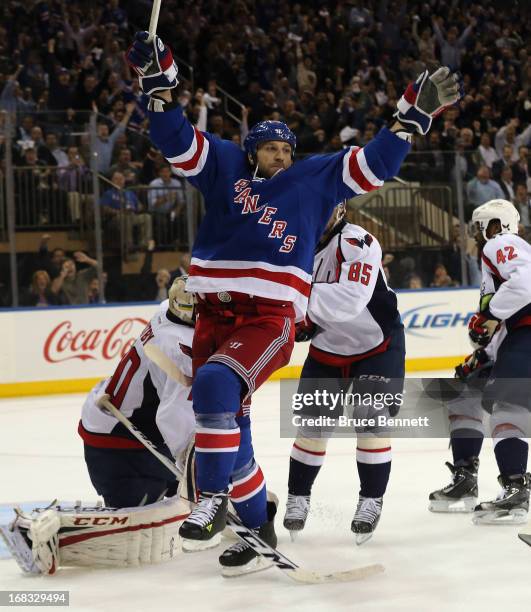 Ryane Clowe of the New York Rangers celebrates a goal by Carl Hagelin at 10:13 of the second period against the Washington Capitals in Game Four of...