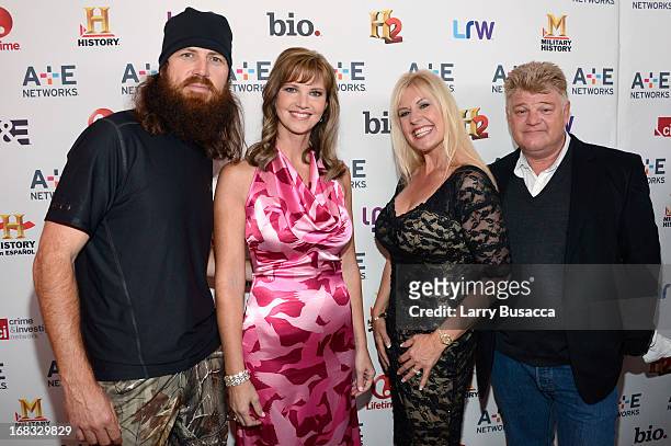 Jase Robertson and Missy Robertson of "Duck Dynasty" pose with Laura Dotson and Dan Dotson of "Storage Wars" at the A+E Networks 2013 Upfront on May...