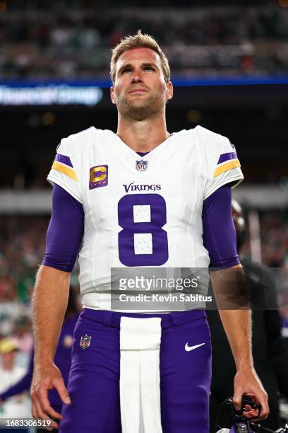 Kirk Cousins of the Minnesota Vikings stands on the sidelines during the national anthem prior to an NFL football game against the Philadelphia...