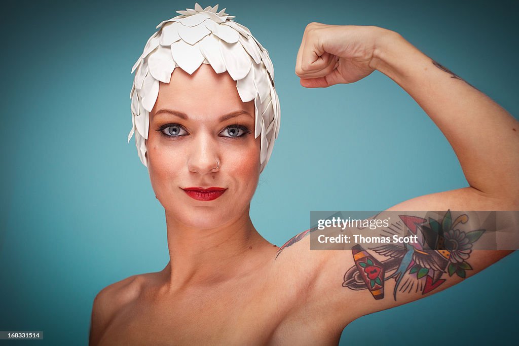 Woman flexing muscle