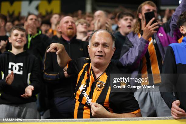 Hull City fans shows their support during the Sky Bet Championship match between Hull City and Coventry City at MKM Stadium on September 15, 2023 in...