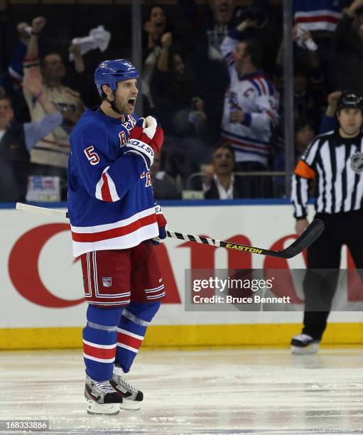 Dan Girardi of the New York Rangers celebrates his powerplay goal at 59 seconds of the third period against the Washington Capitals in Game Four of...