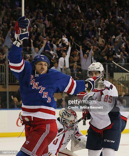 Ryane Clowe of the New York Rangers celebrates a goal by Carl Hagelin at 10:13 of the second period against the Washington Capitals in Game Four of...