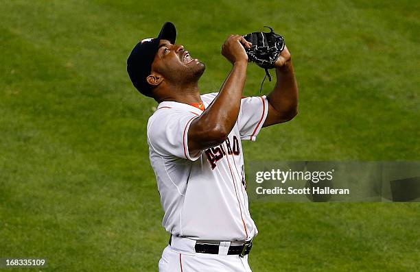 Jose Veras of the Houston Astros celebrates getting a save in the ninth inning during a 3-1 victory over the Los Angeles Angels of Anaheim at Minute...