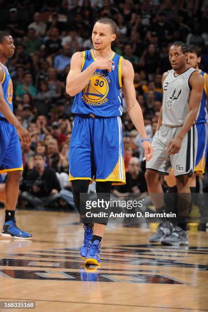Stephen Curry of the Golden State Warriors reacts after a play against the San Antonio Spurs in Game Two of the Western Conference Semifinals during...