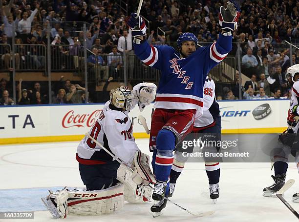 Ryane Clowe of the New York Rangers celebrates a goal by Carl Hagelin at 10:13 of the second period against the Washington Capitals in Game Four of...