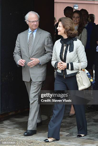 King Carl XVI Gustaf of Sweden and Queen Silvia of Sweden visit Castle Clinton National Monument at Battery Park on May 8, 2013 in New York City.