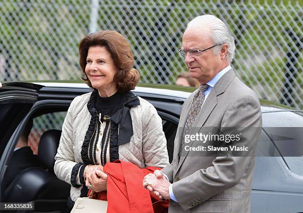 Queen Silvia of Sweden and King Carl XVI Gustaf of Sweden visit Castle Clinton National Monument at Battery Park on May 8, 2013 in New York City.