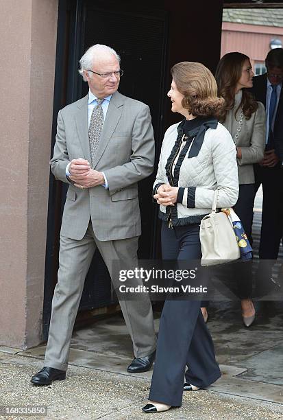 King Carl XVI Gustaf of Sweden and Queen Silvia of Sweden visit Castle Clinton National Monument at Battery Park on May 8, 2013 in New York City.