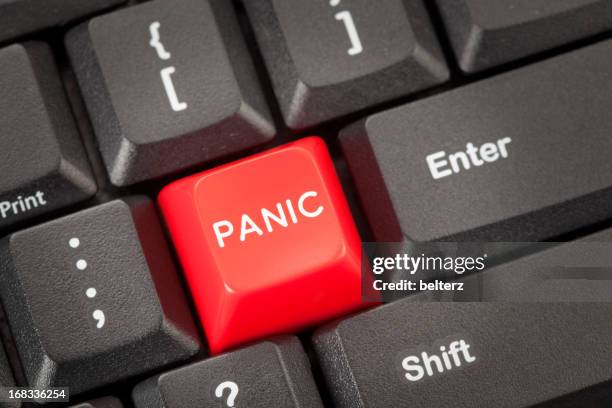 red button marked panic on computer keyboard - panic button stock pictures, royalty-free photos & images