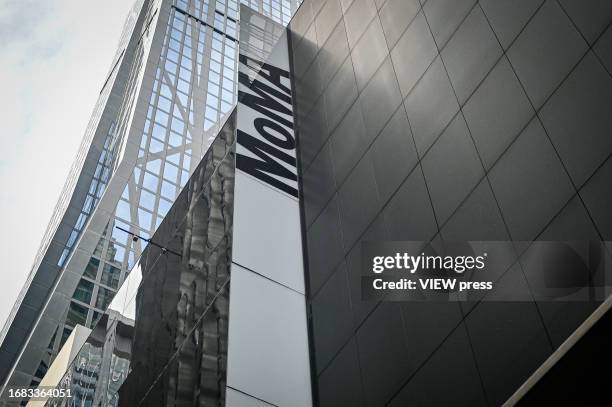 Climate activists participate in a rally outside of the Museum of Modern Art on September 15, 2023 in New York City.