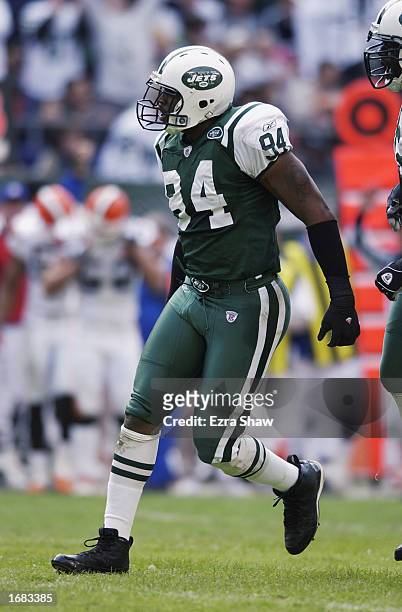 Defensive End John Abraham of the New York Jets looks on during the NFL game against the Cleveland Browns at Giant Stadium on October 27, 2002 in...