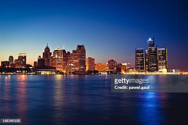 detroit skyline by night - detroit michigan stock pictures, royalty-free photos & images