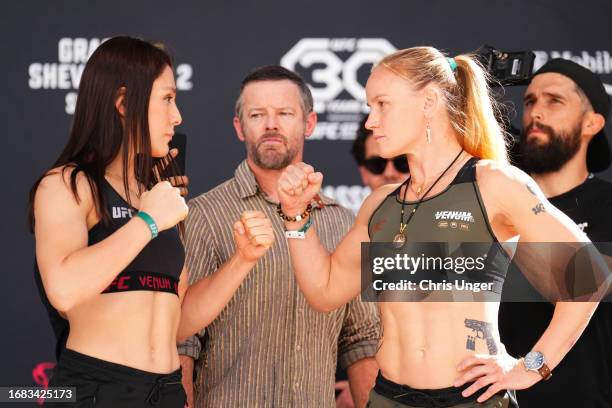 Alexa Grasso of Mexico and Valentina Shevchenko of Kyrgyzstan face off during the Noche UFC ceremonial weigh-in at Toshiba Plaza on September 15,...