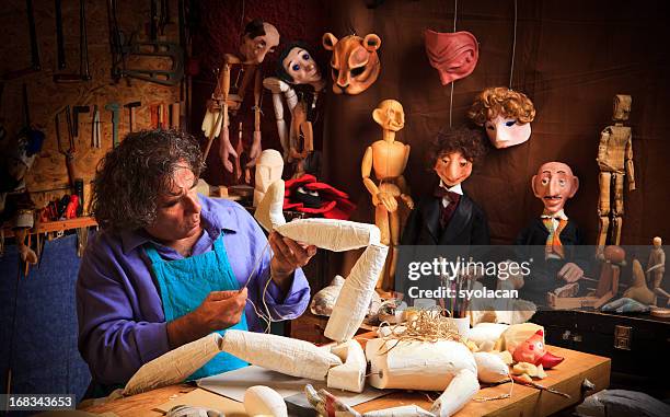 puppet  maker - syolacan stock pictures, royalty-free photos & images