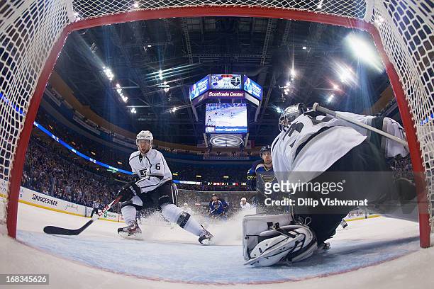 Jake Muzzin and Jonathan Quick both of the Los Angeles Kings defend the goal against the St. Louis Blues in Game Five of the Western Conference...