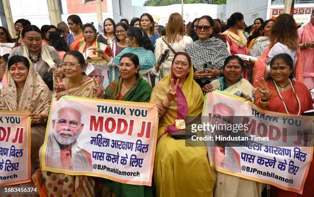 Women BJP MPs and party workers during the 'Nari Shakti Vandan-Abhinandan Karyakram, a day after Parliament passed the women's reservation bill, at...