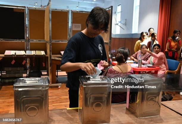 Students casting their votes for DUSU University student's union elections, at Miranda college North Campus, on September 22, 2023 in New Delhi,...