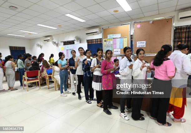 Students stand in queue to cast their votes for DUSU University student's union elections, at Miranda college North Campus, on September 22, 2023 in...