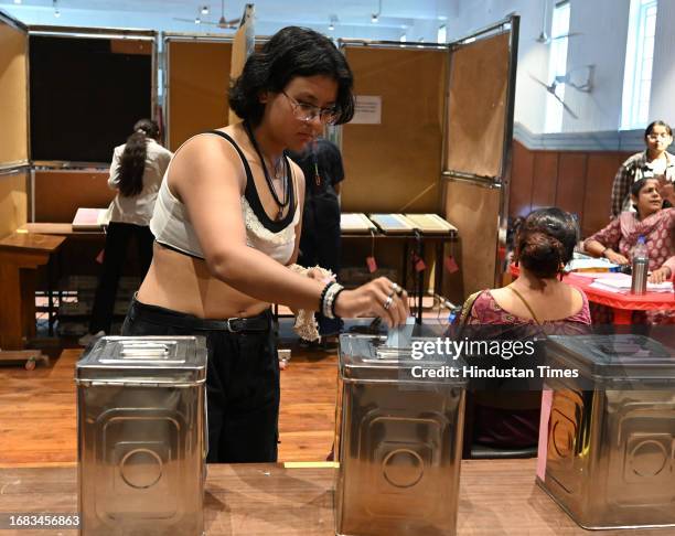 Students casting their votes for DUSU University student's union elections, at Miranda college North Campus, on September 22, 2023 in New Delhi,...