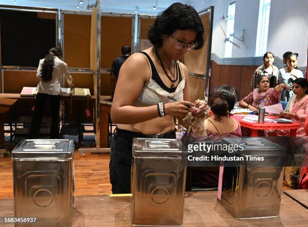 Students casting their votes for DUSU University student's union elections, at Miranda college North Campus, on September 22, 2023 in New Delhi,...