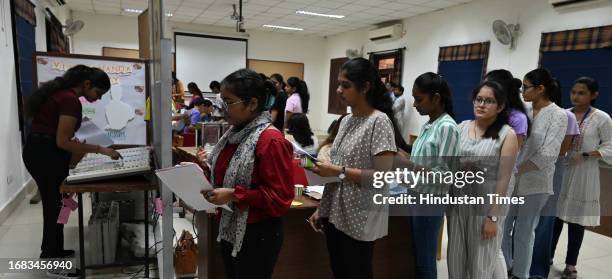 Students stand in queue to cast their votes for DUSU University student's union elections, at Miranda college North Campus, on September 22, 2023 in...