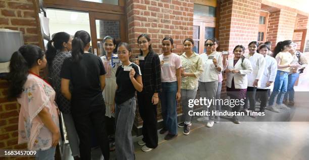 Students stand in queue to cast their votes for DUSU University student's union elections, at Miranda college North Campus, on September 22, 2023 in...