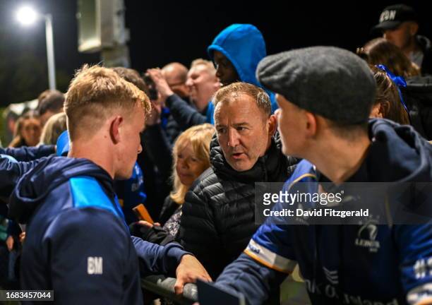Meath , Ireland - 22 September 2023; Ireland U21 head coach Richie Murphy speaks to his son Ben Murphy of Leinster after the pre season friendly...