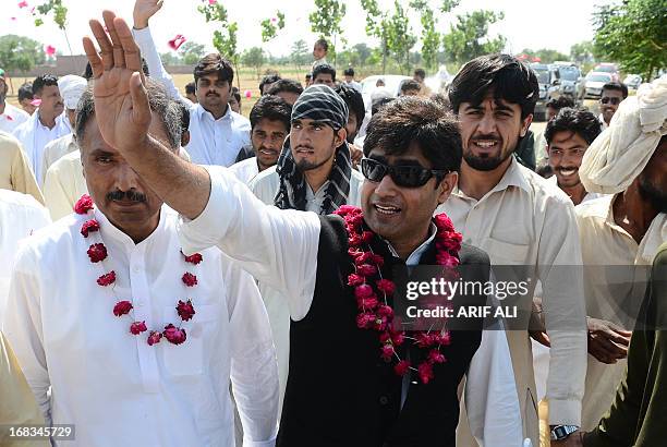 Pakistan-unrest-vote-candidate-Haq by Issam Ahmed In this photograph taken on May 8, 2013 shows Abrar-ul-Haq , a candidate for the national assembly...