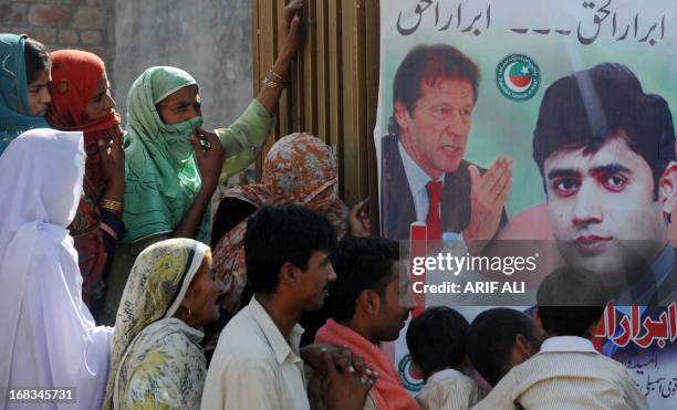 Pakistan-unrest-vote-candidate-Haq by Issam Ahmed In this photograph taken on May 8, 2013 supporters of Abrar-ul-Haq, a candidate for the national...