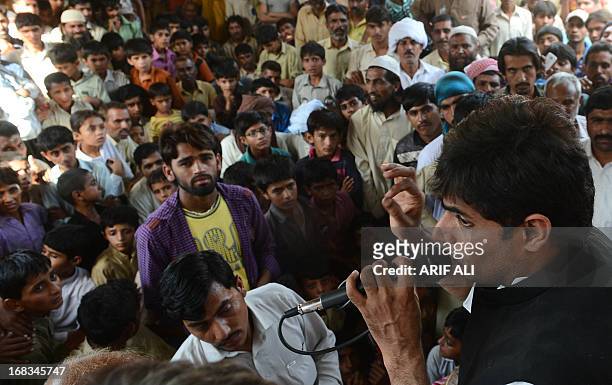 Pakistan-unrest-vote-candidate-Haq by Issam Ahmed In this photograph taken on May 8, 2013 Abrar-ul-Haq , a candidate for the national assembly for...