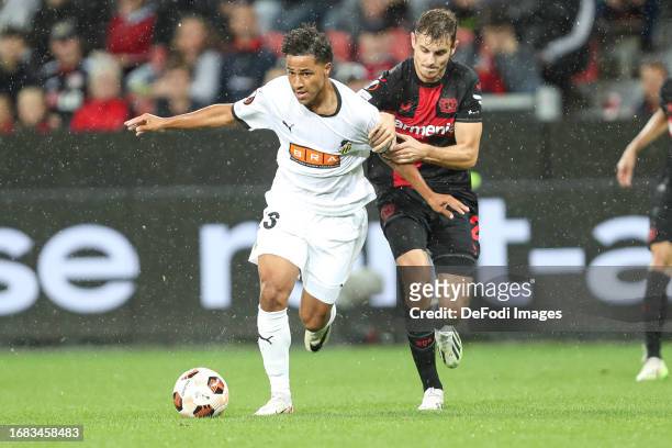 Momodou Lamin Sonko of BK Haecken and Josip Stanisic of Bayer 04 Leverkusen battle for the ball during the UEFA Europa League 2023/24 group stage...