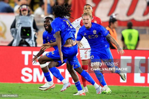 Nice's Ivorian forward Jeremie Boga celebrates after scoring a goal during the French L1 football match between AS Monaco and OGC Nice at the Louis...