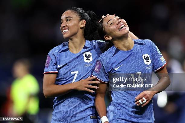 France's defender Selma Bacha celebrates with France's defender Sakina Karchaoui after scoring her team's second goal during the UEFA Women's Nations...