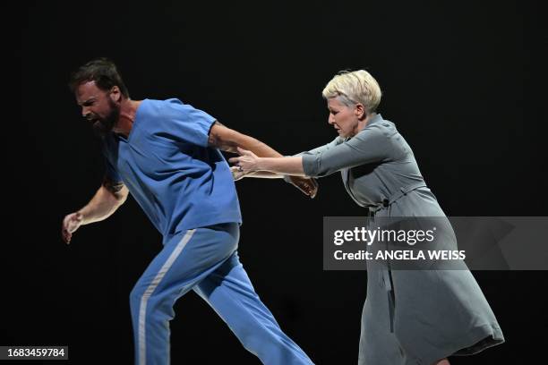 Opera singers Joyce DiDonato and Ryan McKinny perform during the dress rehearsal of "Dead Man Walking" at the Metropolitan Opera in New York on...