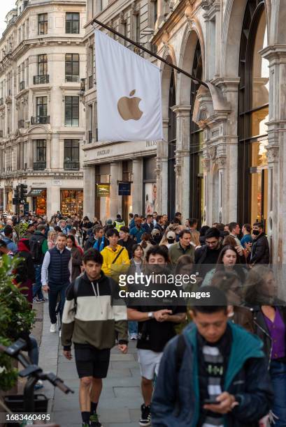 People seen queuing outside Apple Store in Regent Street. The iPhone 15 goes on sale 22nd September 2023.