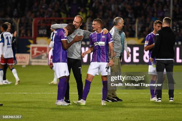 Oumar Diakhite, Michael Cuisance, and Martin Heck of Osnabrueck celebrates after winning during the Second Bundesliga match between VfL Osnabrück and...