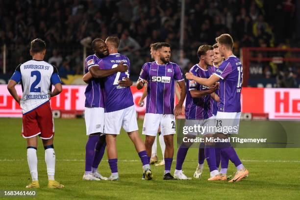 Oumar Diakhite, Henry Rorig, Dave Gnaase, Florian Kleinhansl, and John Verhoek of Osnabrueck celebrate after winning during the Second Bundesliga...