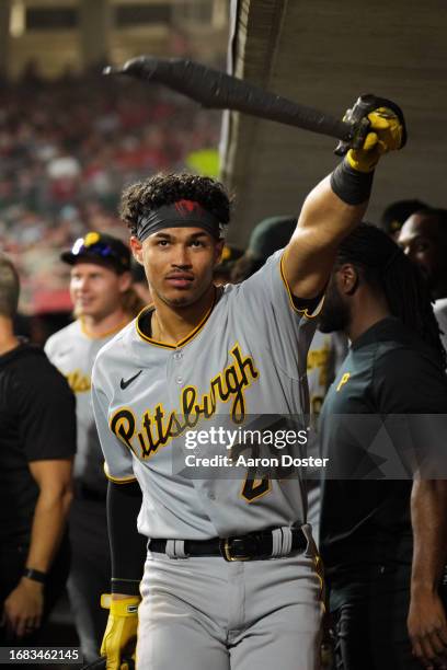 Endy Rodriguez of the Pittsburgh Pirates celebrates in the dugout after hitting a home run in the sixth inning during the game between the Pittsburgh...