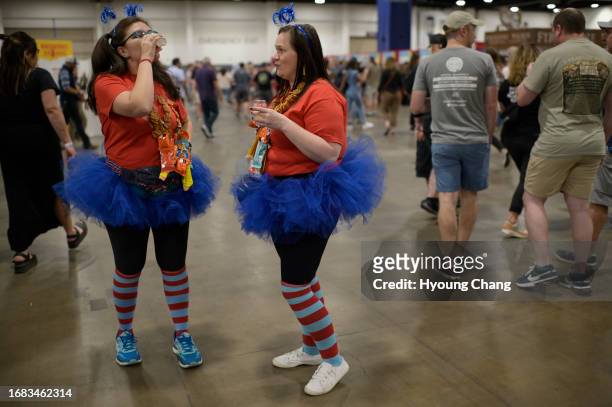 Kristen Snyder, left, and Stephanie Hayden are having beers during Great American Beer Festival at Colorado Convention Center in Denver, Colorado on...