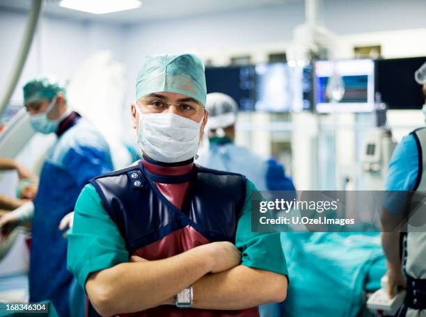 cardiologist doctor in the operation room - angioplasty stock pictures, royalty-free photos & images